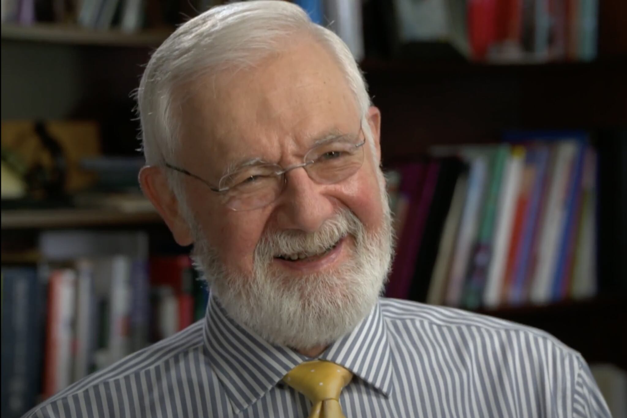 Bill Foege smiles in a headshot.