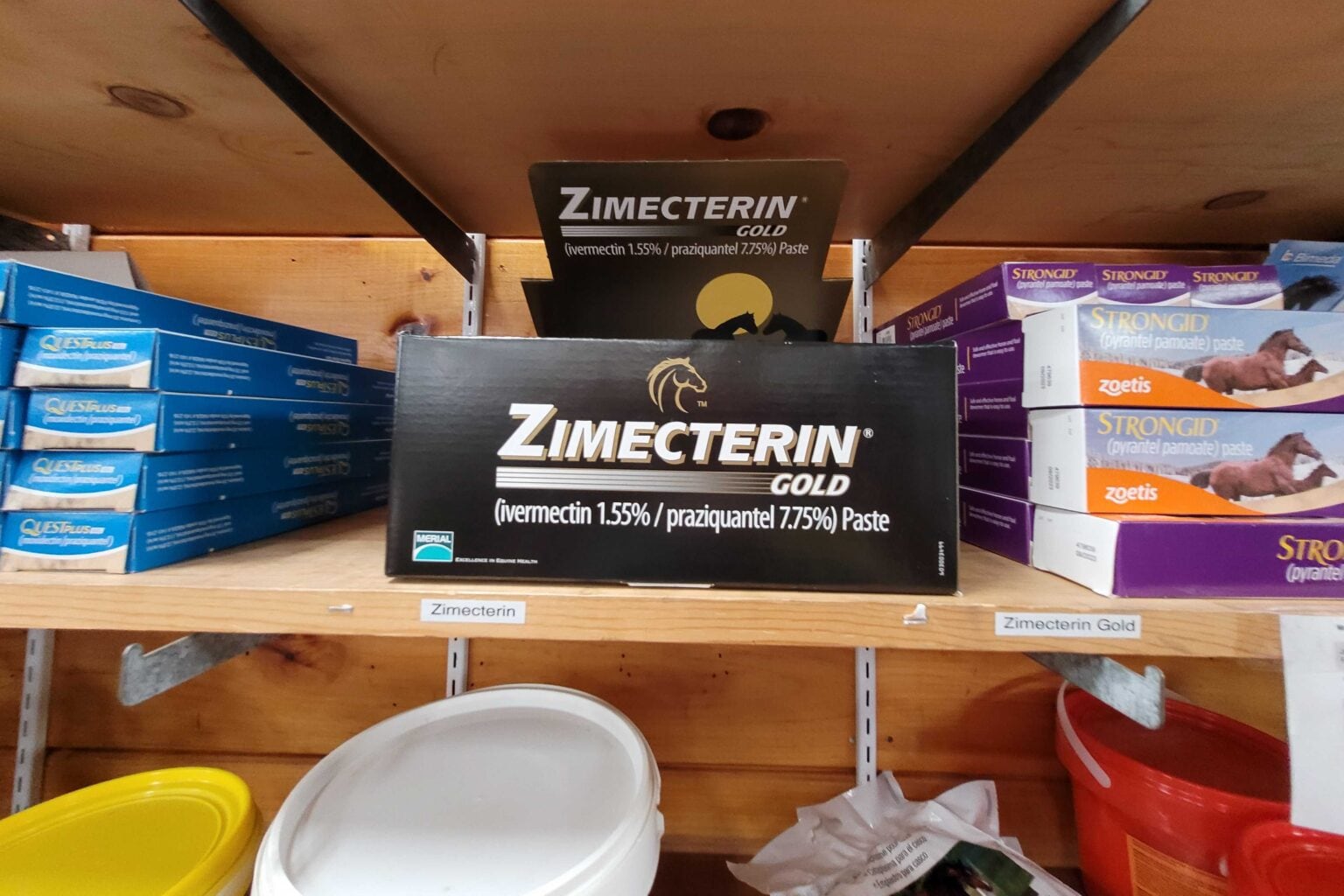 Ivermectin for horses sits on a store shelf.