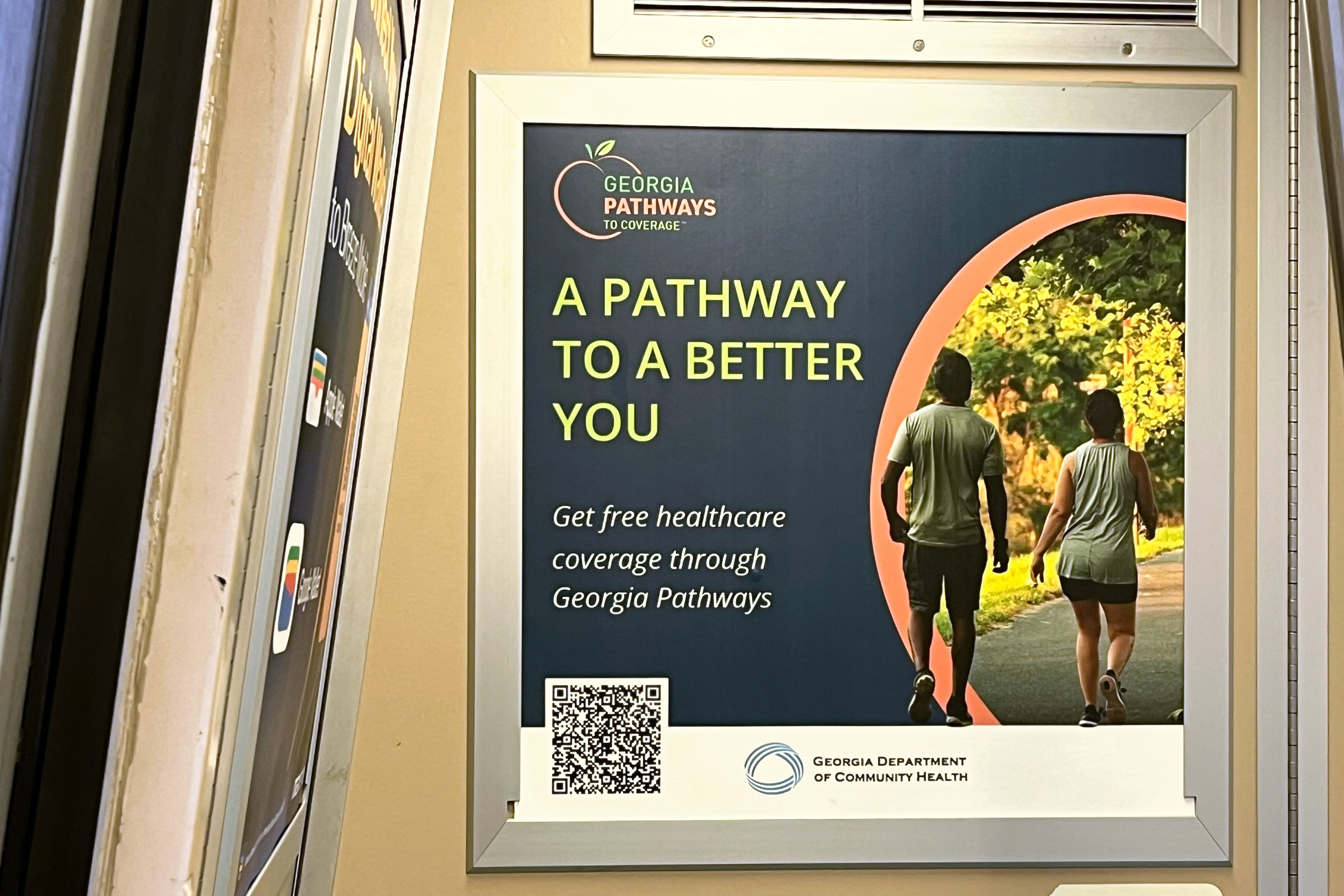 A train advertisement in Atlanta promotes Georgia Pathways to Coverage.