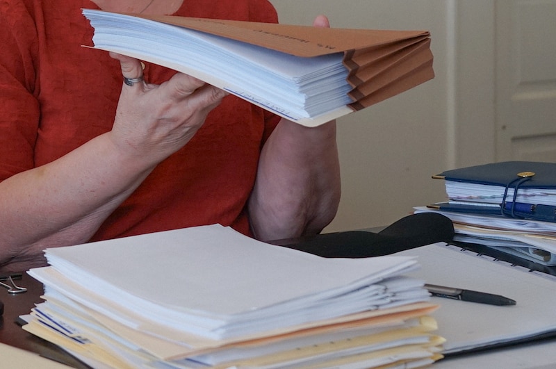 A stack of papers related to federal grant applications.