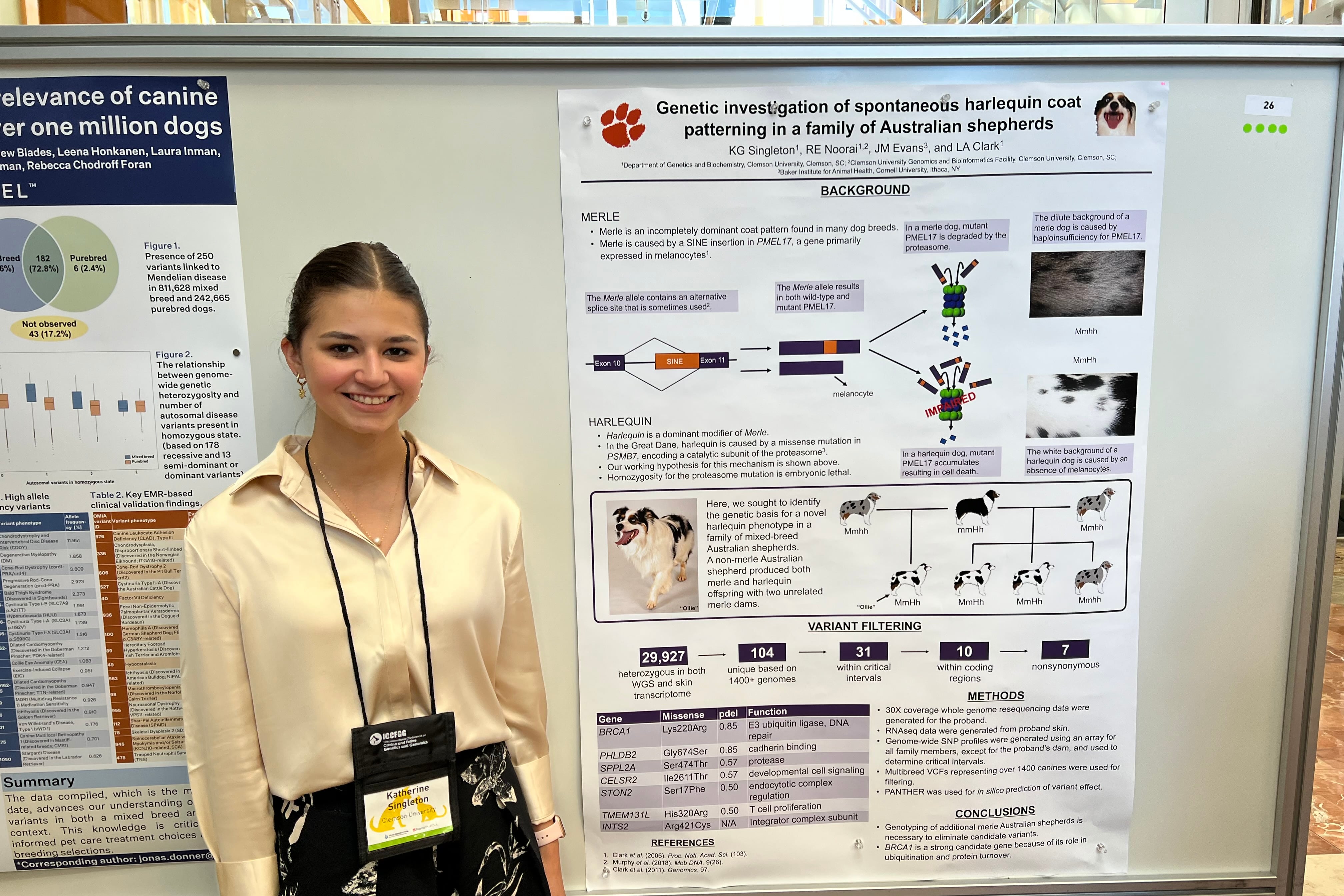 Katherine Grace Singleton stands in front of a presentation board.