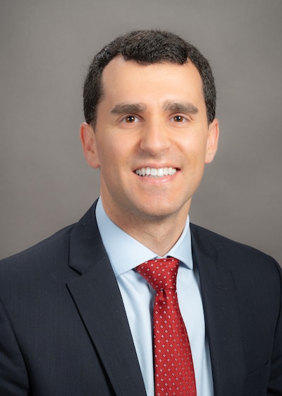 A portrait of Dr. James Miller.