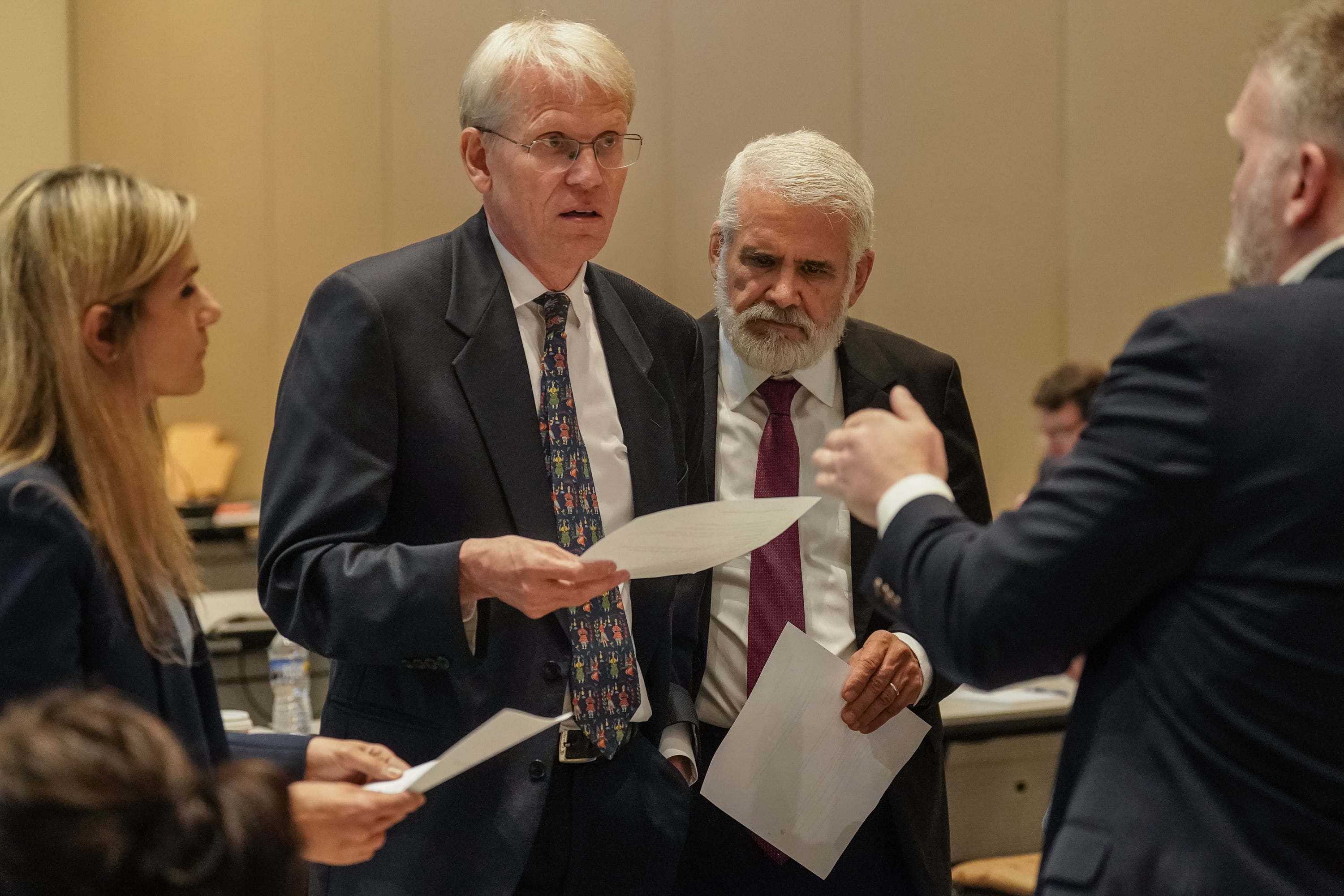 Health officials gather for a meeting.