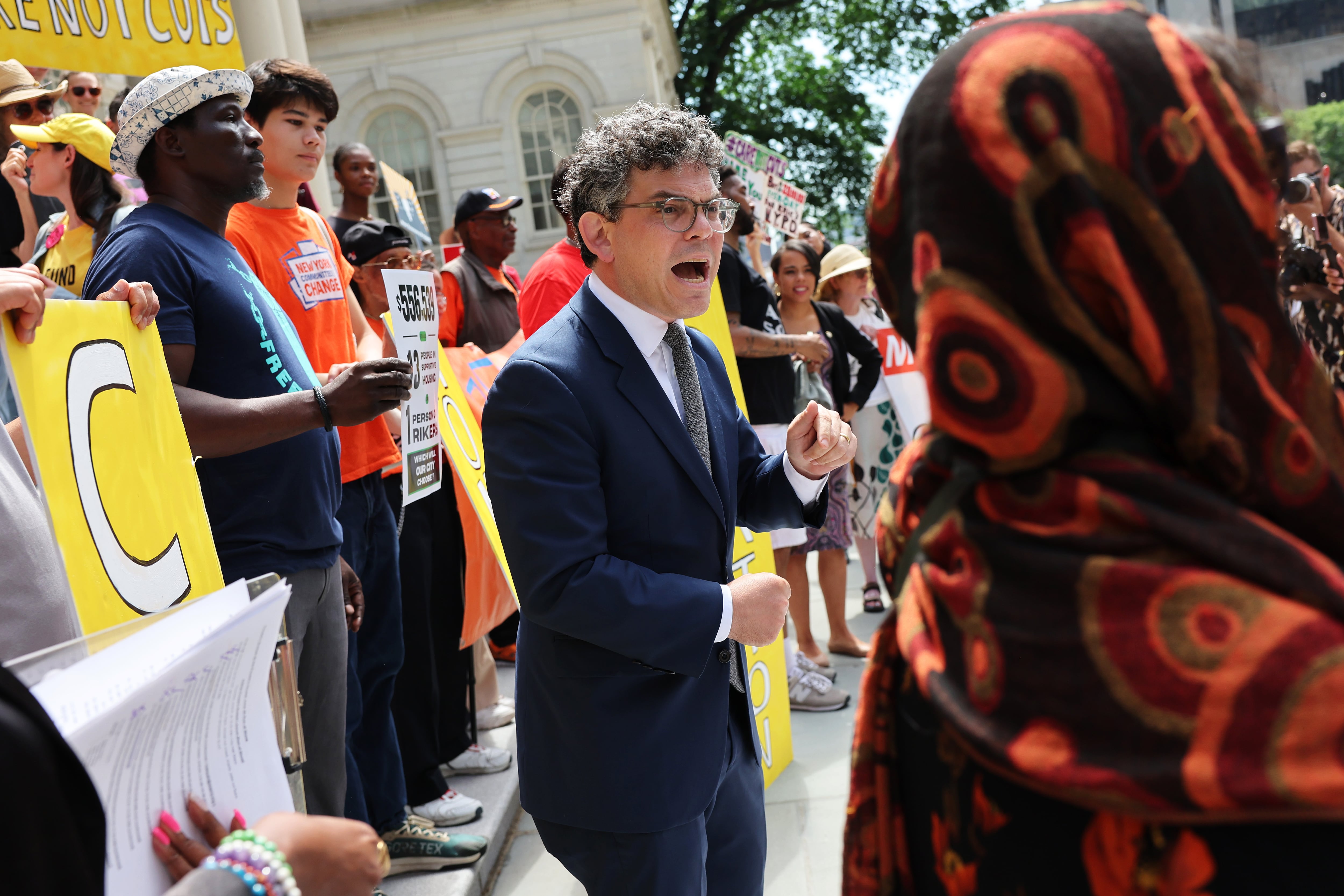 Councilmember Lincoln Restler speaks during a rally at New York City Hall.