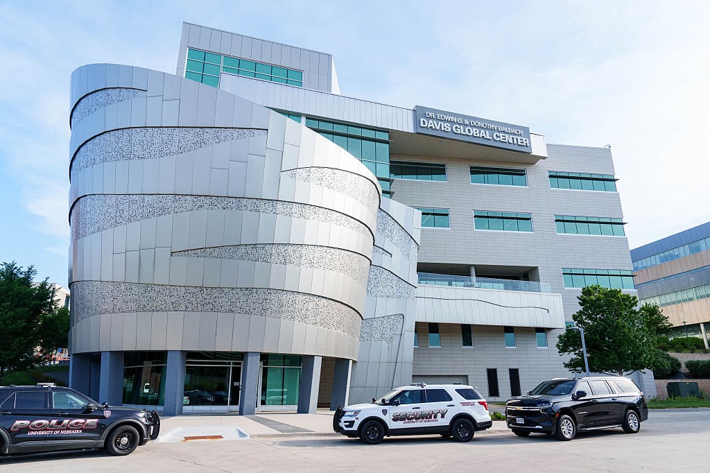 Image shows a metal and glass office medical office building with a circular, swoopy entrance.