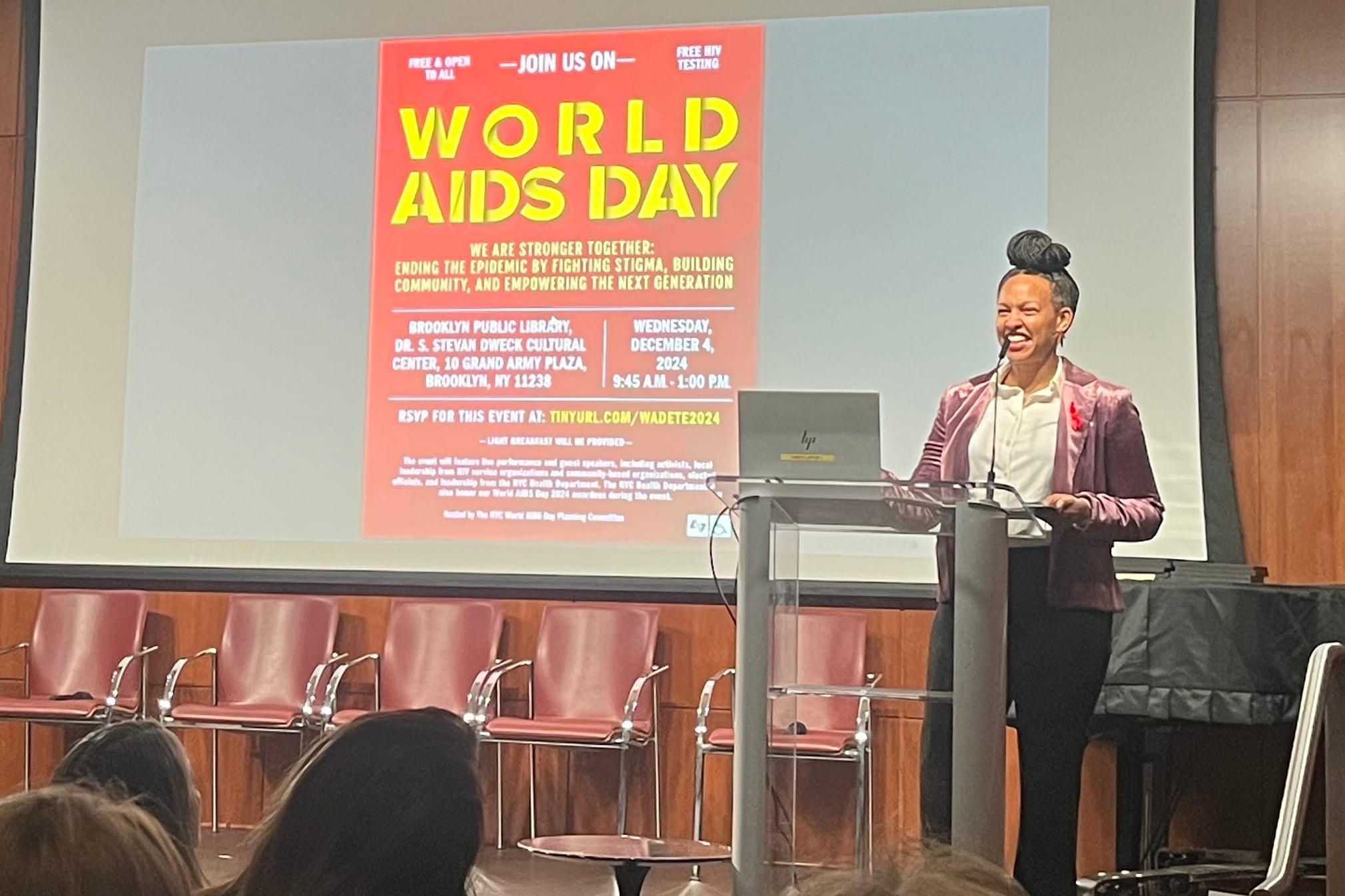 Dr. Michelle Morse speaks from a podium.