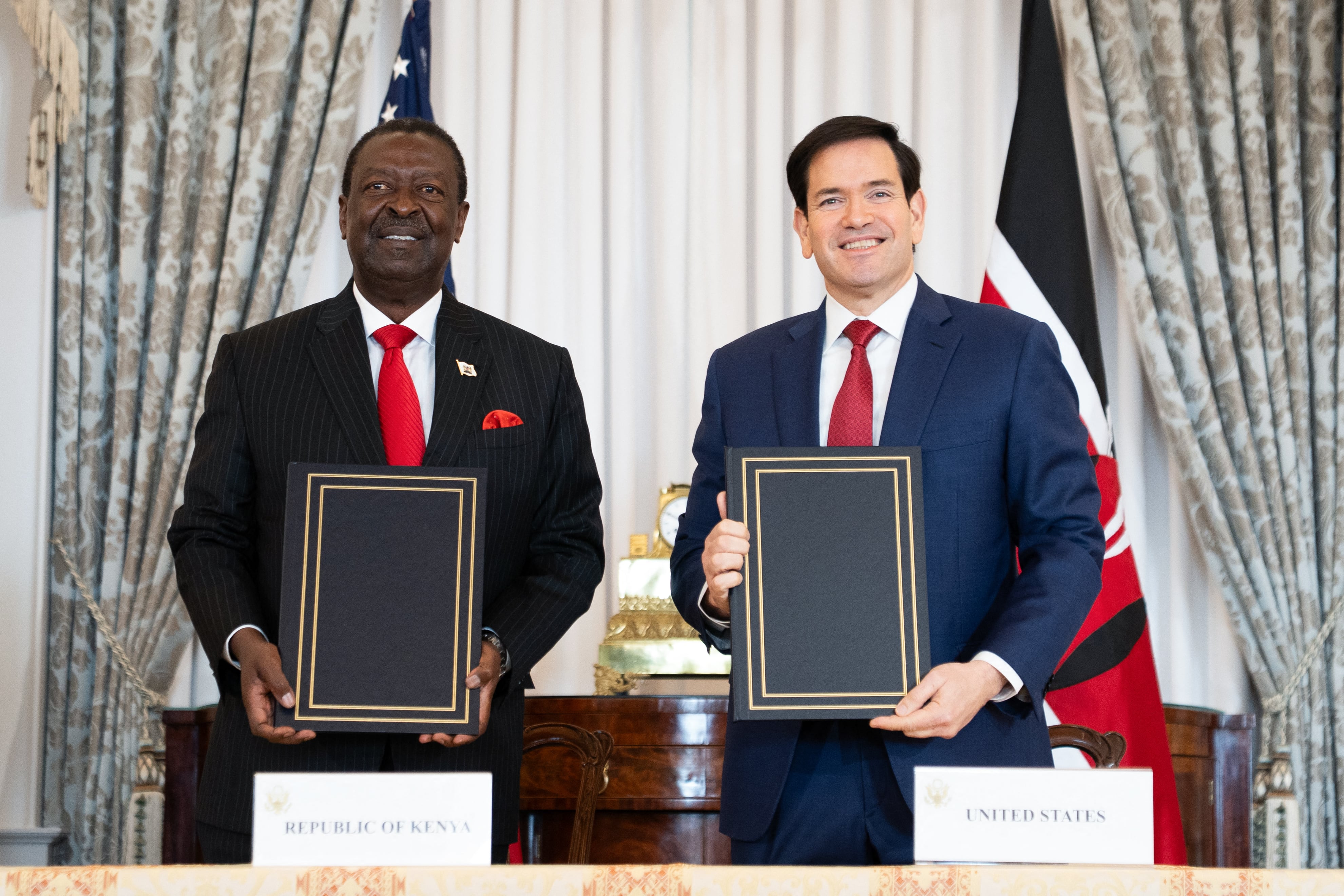U.S. Secretary of State Marco Rubio and Kenyan Prime Cabinet Secretary Musalia Mudavadi pose next to each other.