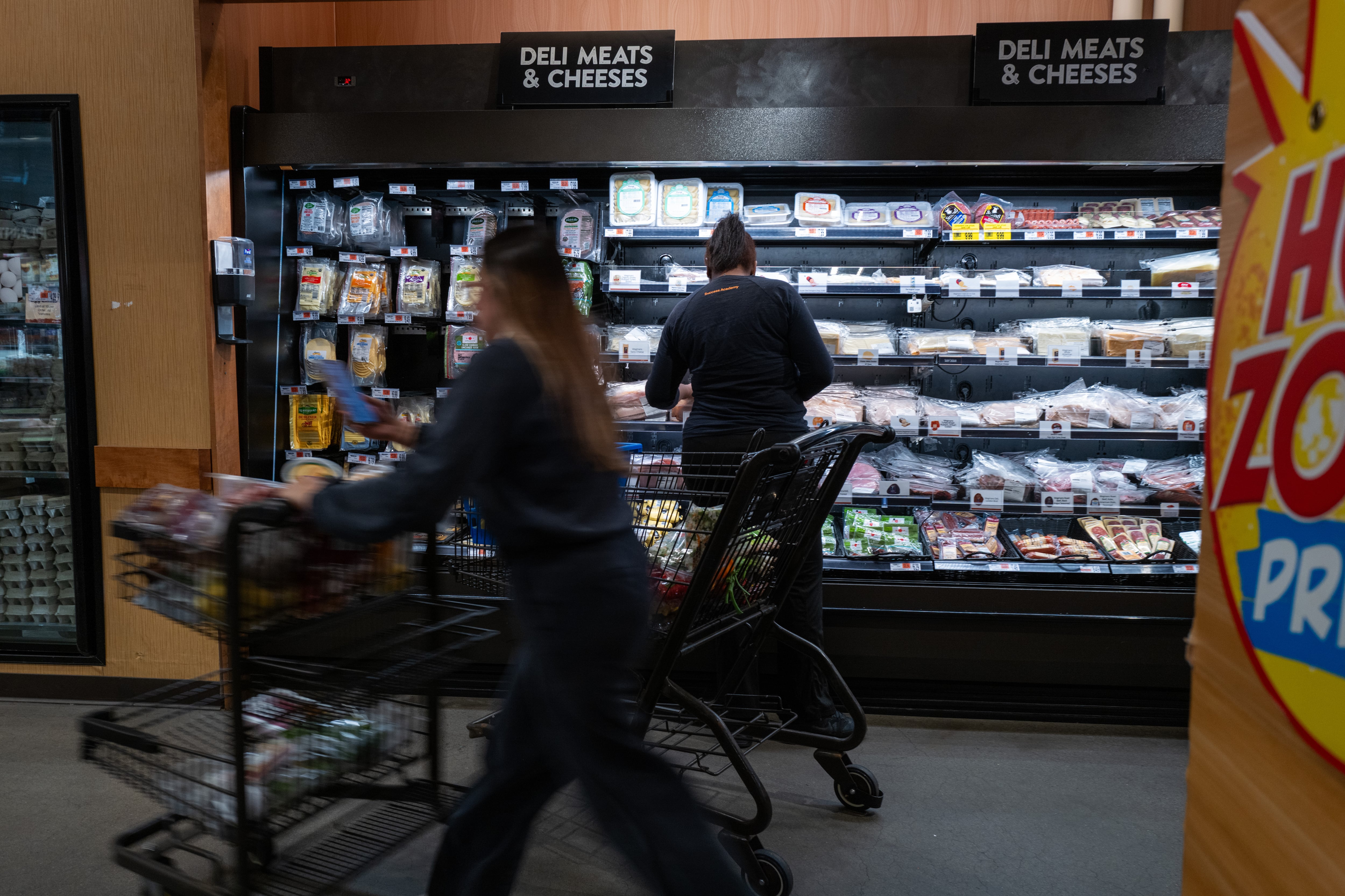 Shoppers inside a New York City grocery store.
