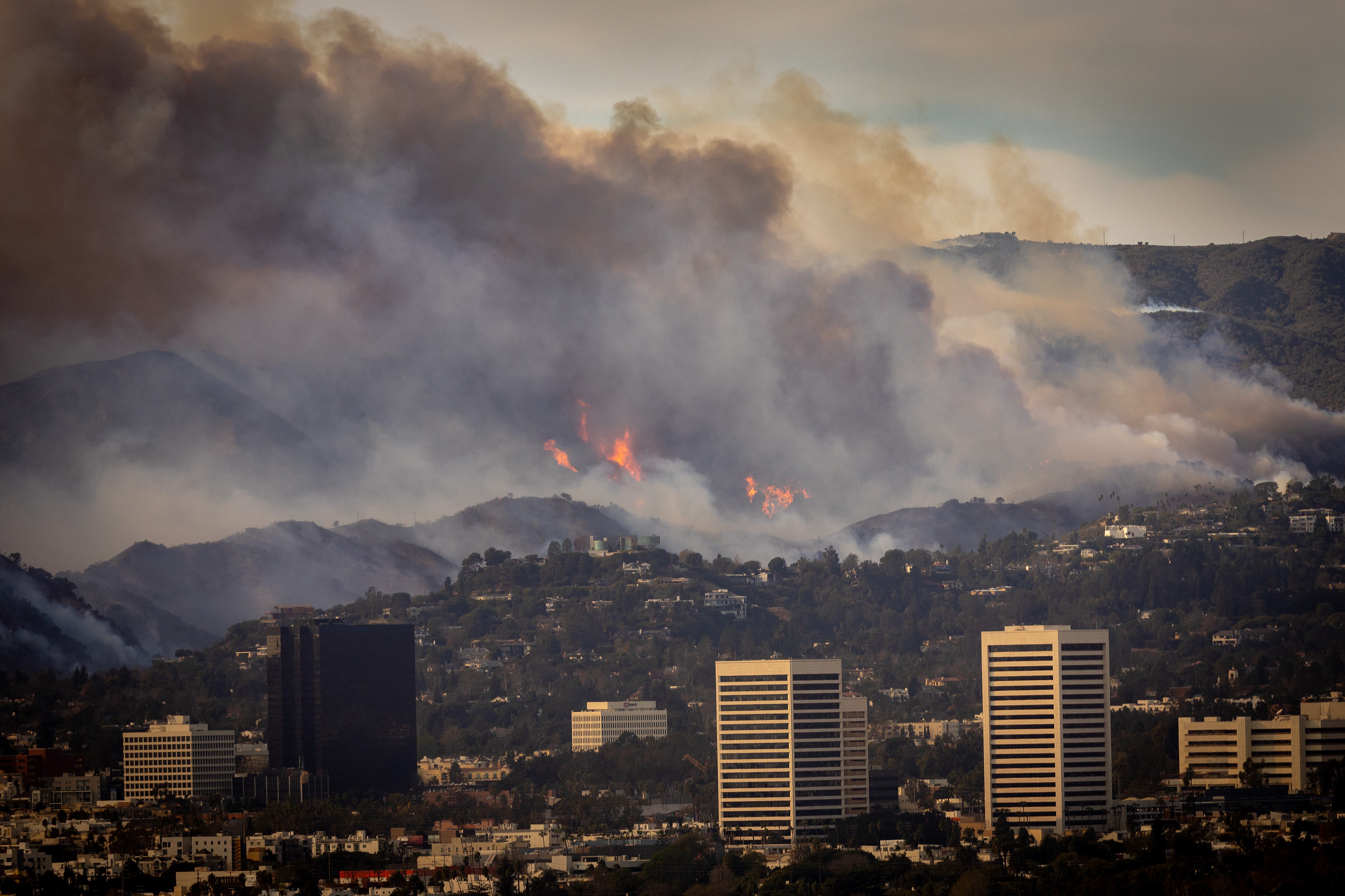 Wildfire smoke from the Palisades and Eaton fires blankets Los Angeles County.