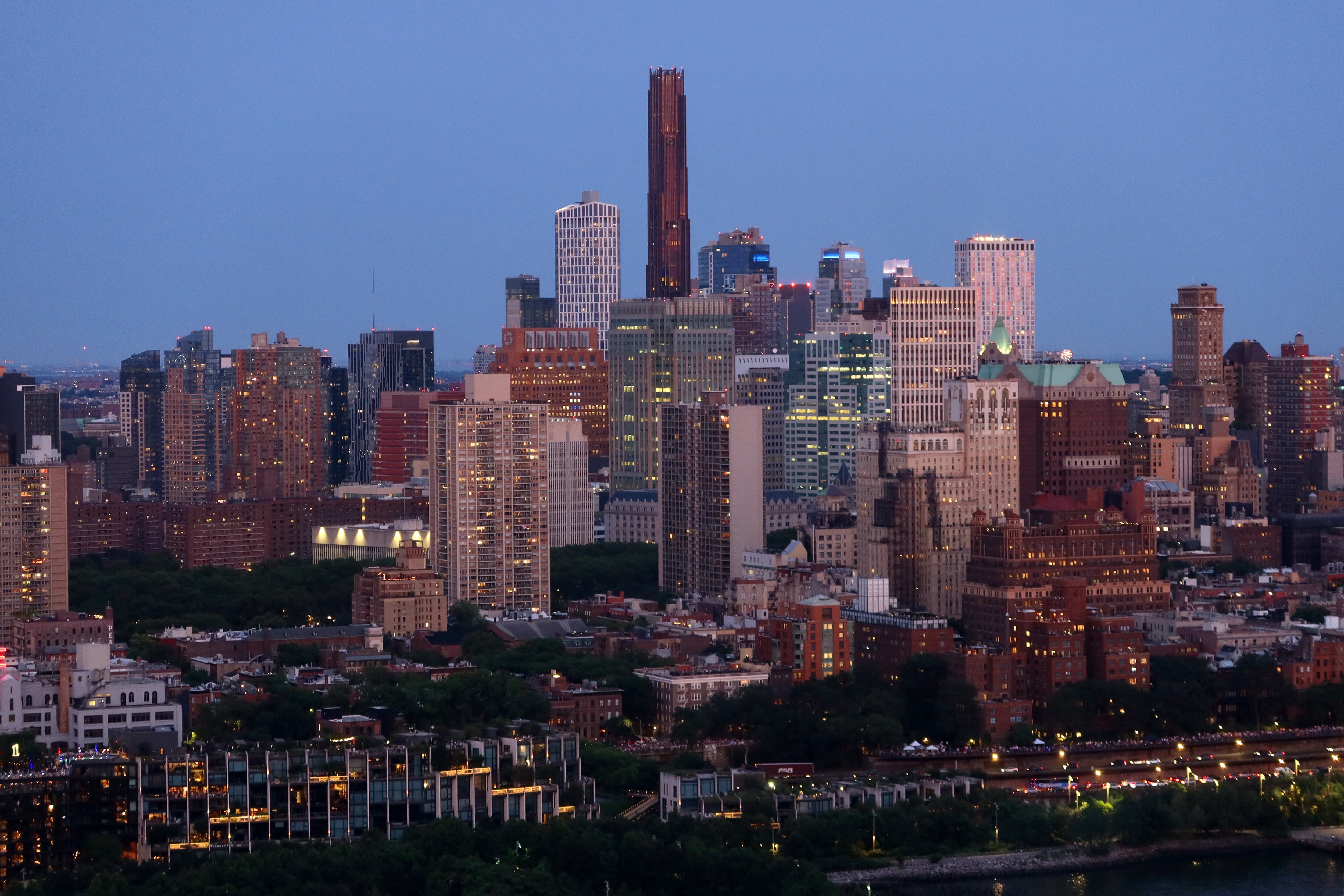 The New York City skyline at sunset.