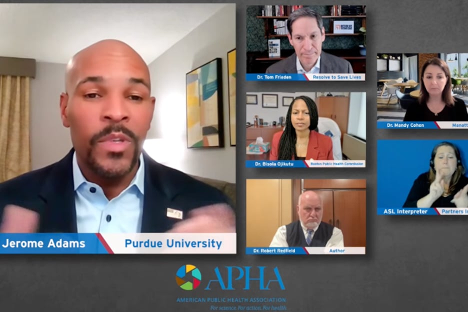 A screenshot shows six speakers on a computer screen participating in a webinar.