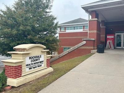 A brick sign outside the Rockdale County Health Department.