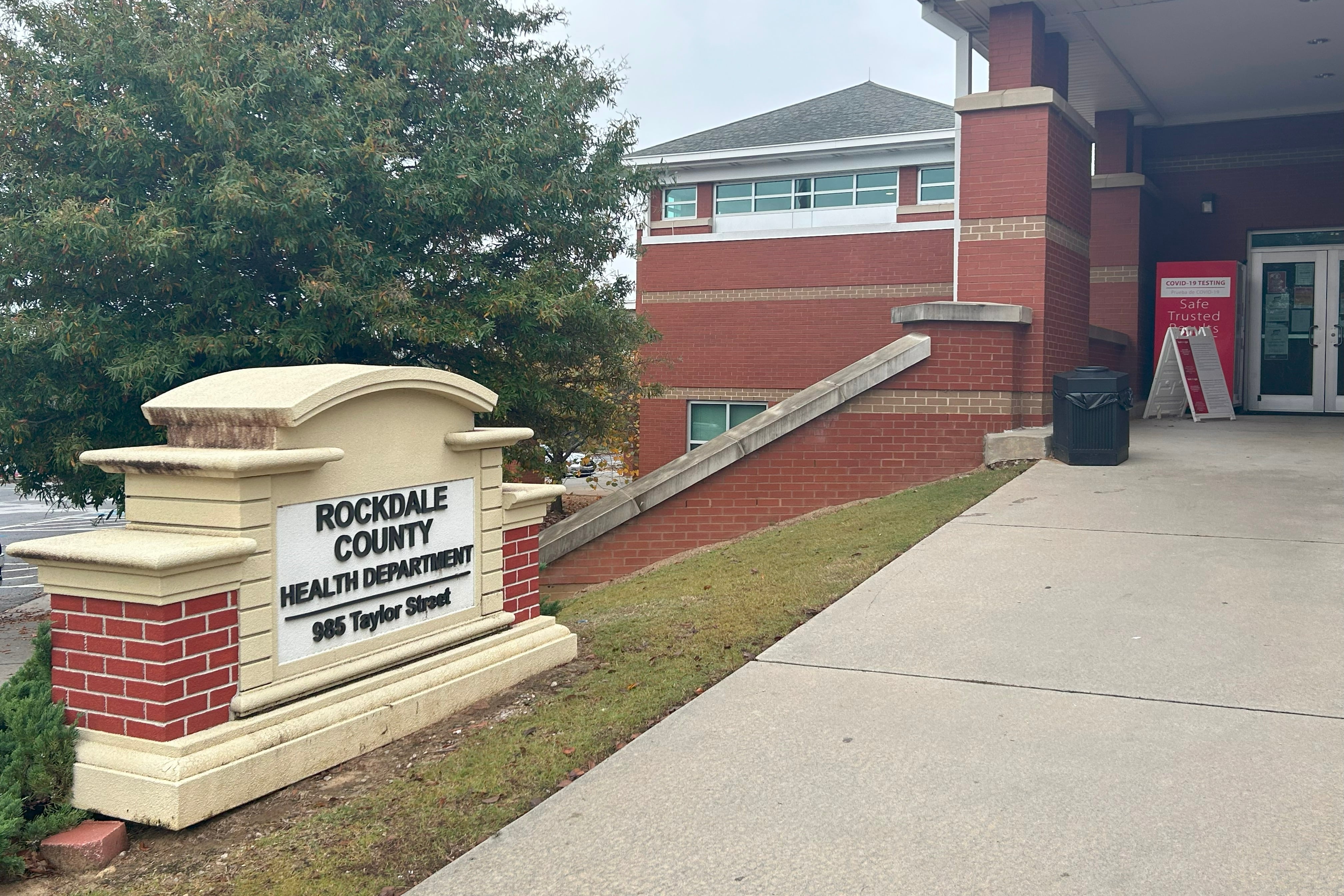 A brick sign outside the Rockdale County Health Department.