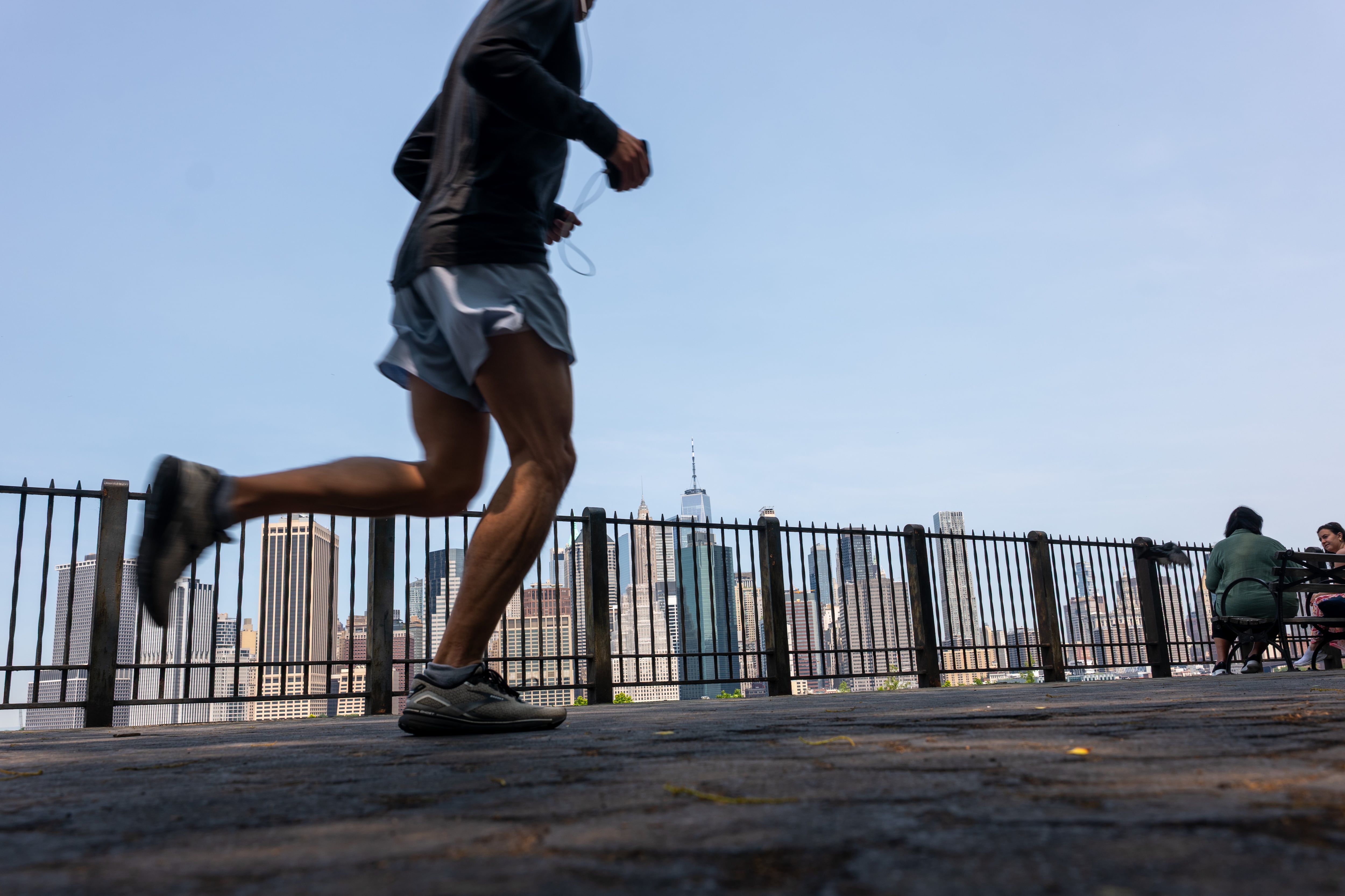 A runner with the New York City skyline in the background.