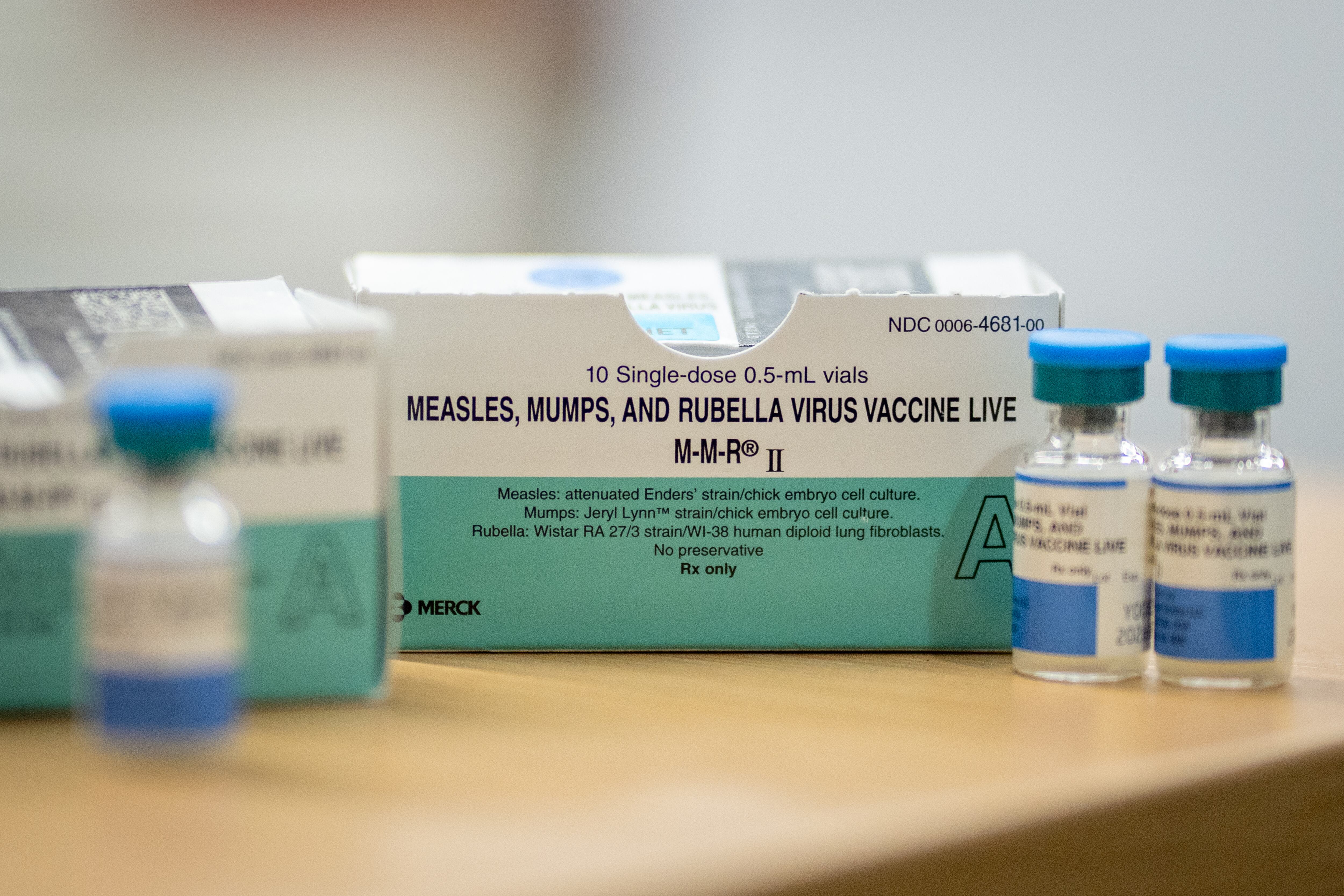 Boxes and vials of the Measles, Mumps, Rubella Virus Vaccine.