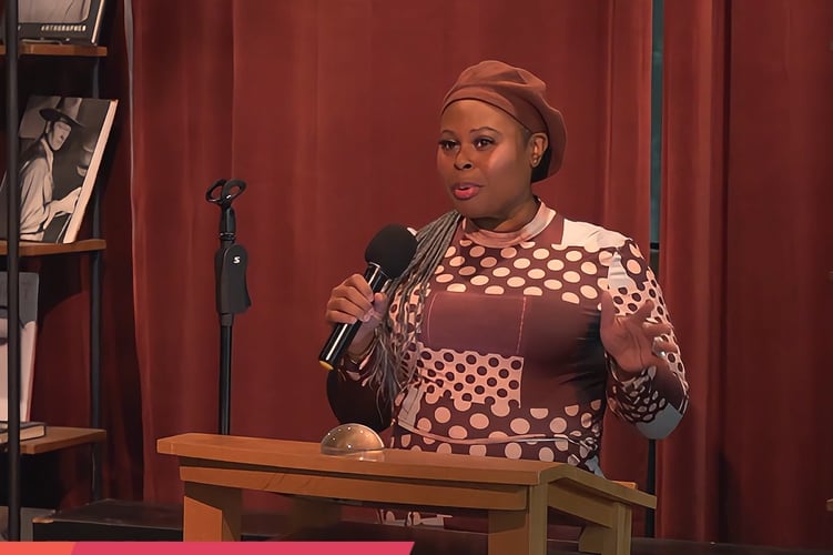 Nadia Shepherd speaks from a podium.